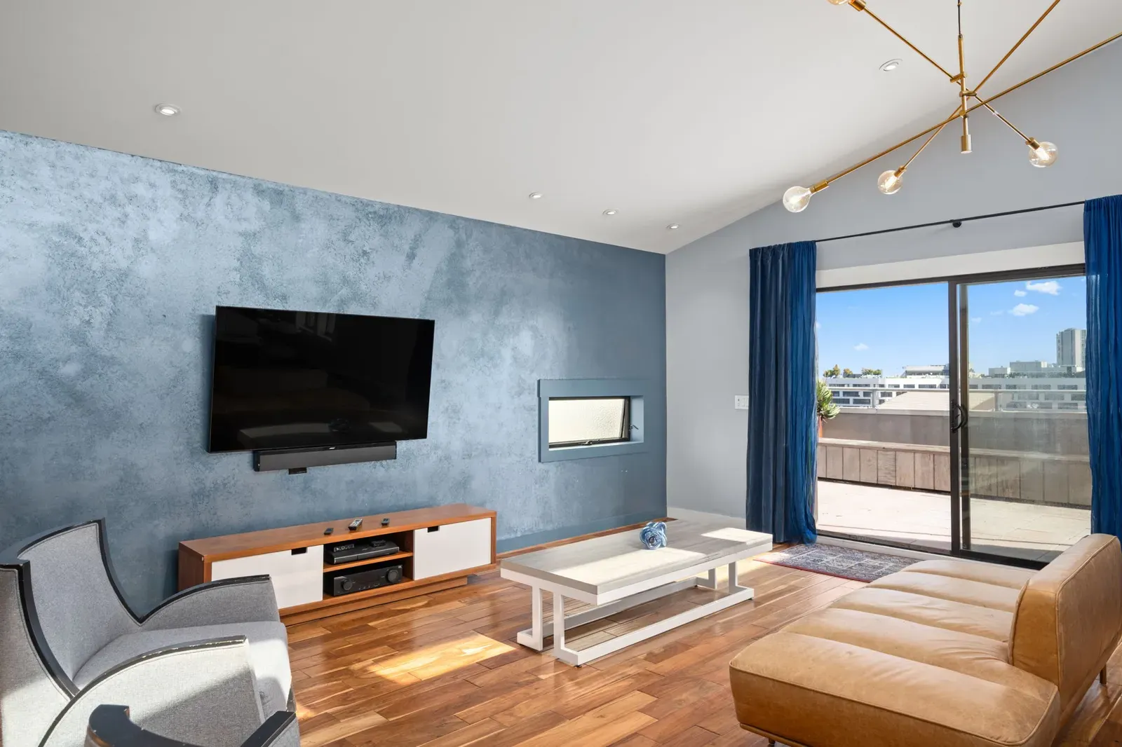 The penthouse living room, with doors onto the terrace